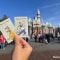 disneyland tickets in front of sleeping beauty castle