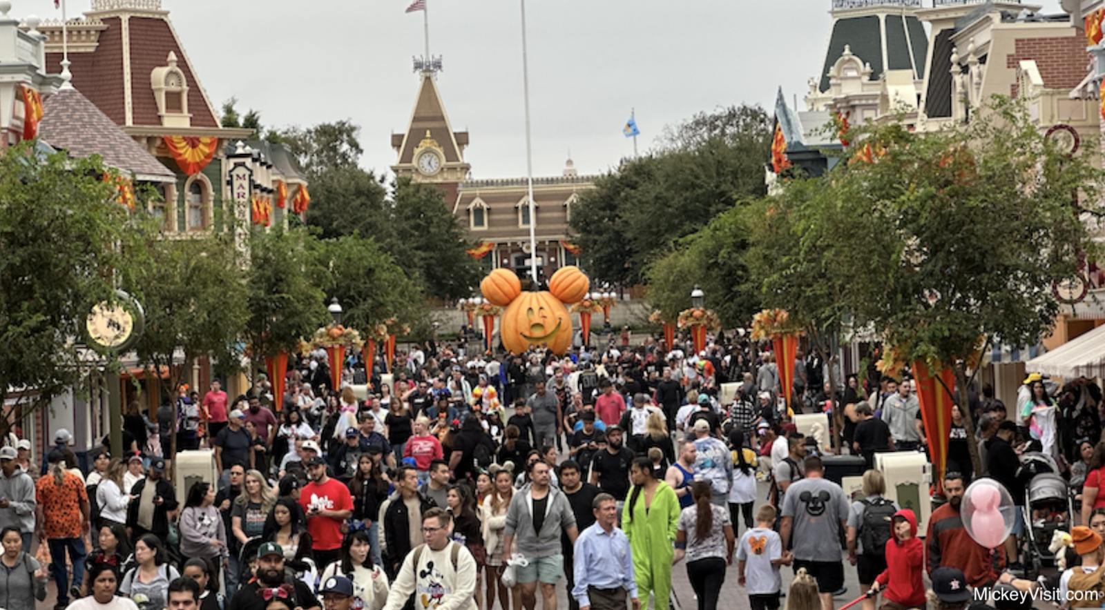 Crowds of people at Disneyland on Halloween